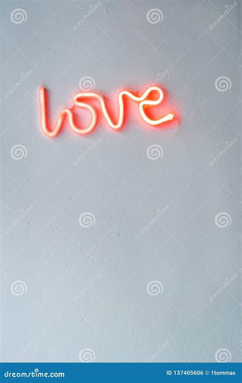Red Neon Love Sign On A White Wall Stock Photo Image Of Color