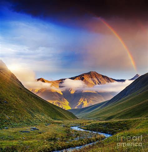 Rainbow Over River And Mountains At Sunset Photograph By Thomas Jones