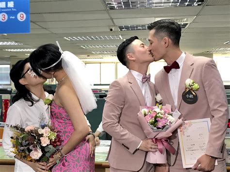 hundreds marry on taiwan s first day of legal same sex marriage after decades long struggle