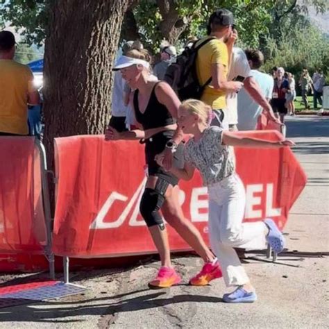 daughter helps mom cross marathon finish line made my heart so full good morning america