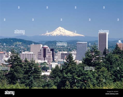 View Of The Portland Oregon Skyline With A Snowcapped Mount Hood Rising