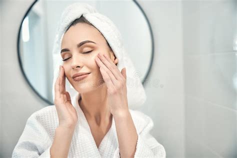 Caucasian Pretty Woman Doing Relaxing Face Massage In Bathroom Stock Image Image Of Nice