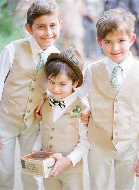 A ring bearer's walk down the aisle is one of the highlights of a wedding ceremony. beach wedding flower boys | Beach Wedding | Pinterest ...