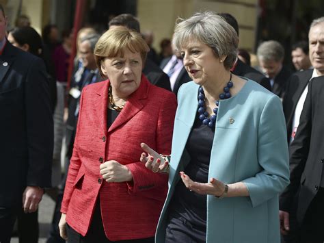 Brexit Angela Merkel Warns Theresa May Over Slashing Taxes To Undercut