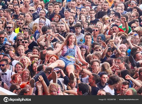 people having fun at a concert on the 23rd woodstock festival poland stock editorial photo