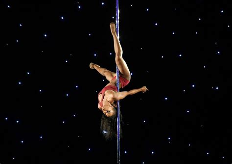 Photos Of Pole Dancing Competition Show Just How Hard It Actually Is