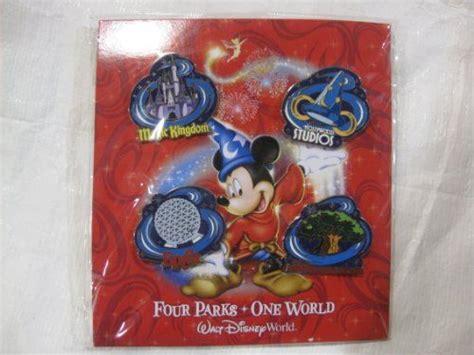 4 Piece Disney Pin Collector Series Four Parksone World Emblems Set