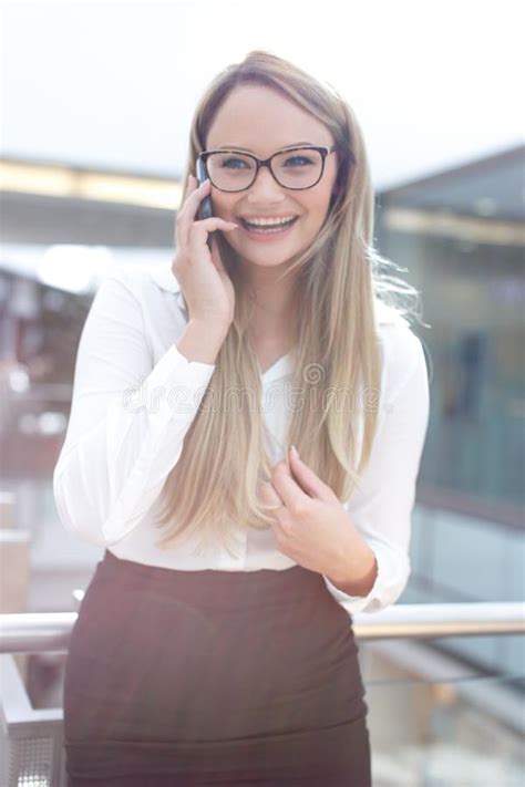 Happy Young Blonde Businesswoman In Eyeglasses Smile And Calling Stock