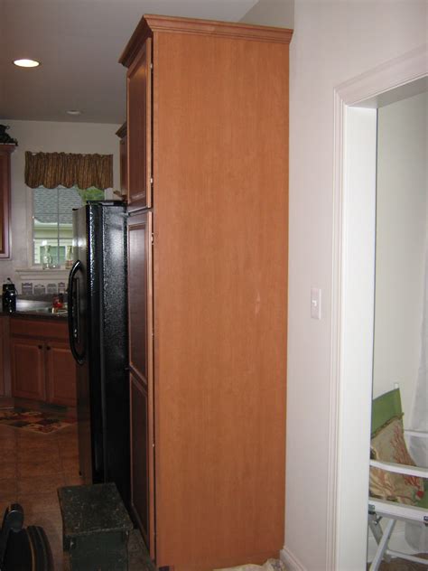 Appliances such as refrigerators, dishwashers, and ovens are often integrated into kitchen cabinetry. Fake-It Frugal: Kitchen Cabinet Menu Board
