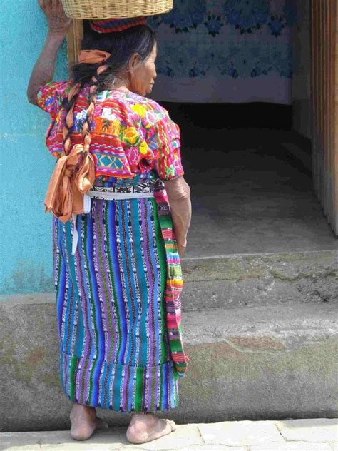 Guatemalan Lady Going To Market In Traditional Handwoven Costume With
