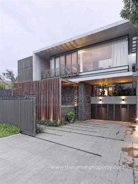 desain eksterior rumah modern dengan pencahayaan maksimal the rumah property