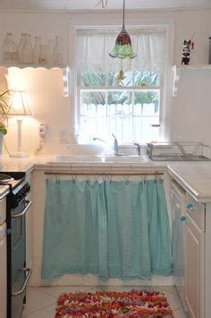 Google sink skirt and you'll likely encounter some pretty unappealing images: 216 Best Decorating - Curtains on cupboards & under sinks ...