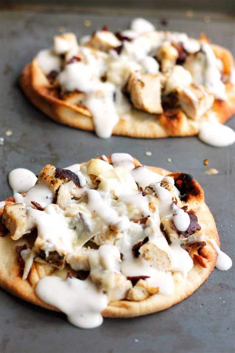 Meanwhile, in a bowl, toss chicken with dressing. Chicken Bacon Ranch Mini Pizzas