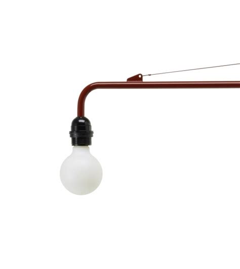 The potence wall lamp displays an incredibly minimalistic approach to lighting, with its use of honest material and pure shapes. Petite Potence Wall Lamp Vitra - Milia Shop