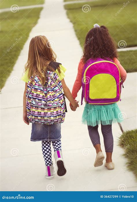 Little Girls Walking To School Together Stock Image Image Of Girls
