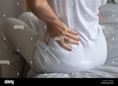 Unhealthy Senior Woman Suffer From Lower Backache Stock Photo Alamy
