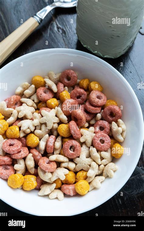 Colored Cereals In A White Bowl Stock Photo Alamy