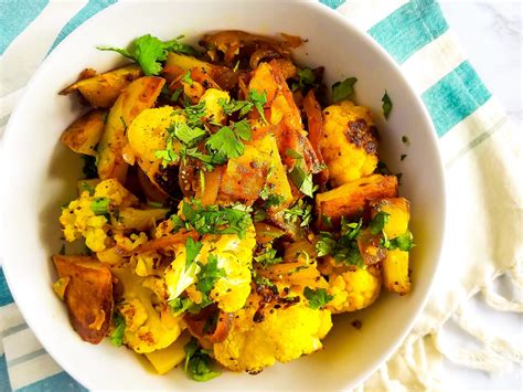 How To Make Alu Gobhi Potatoes And Cauliflower