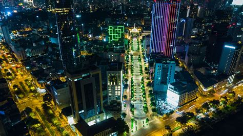 Download Wallpaper 2048x1152 City Aerial View Buildings Road Lights