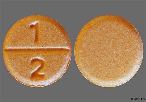 Orange Round With Imprint 12 Pill Images Goodrx