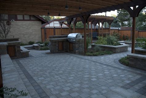 The top level comes off the kitchen and includes the cooking area as well as two dining tables. Paver - Centennial, CO - Photo Gallery - Landscaping Network