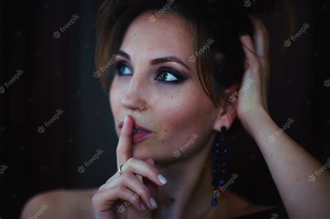 Premium Photo Secret Girl Finger In Mouth Quiet