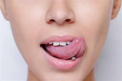 do s and don ts for tongue piercing and aftercare beadnova
