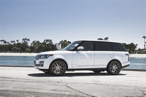 Luxurious Range Rover Sitting On Silver Black Rims By Niche —