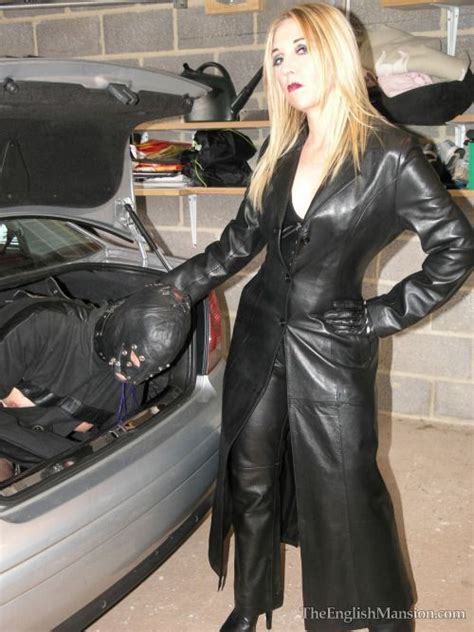 Mistresses In Long Leather Coats Ready To Treat Their Slaves Long