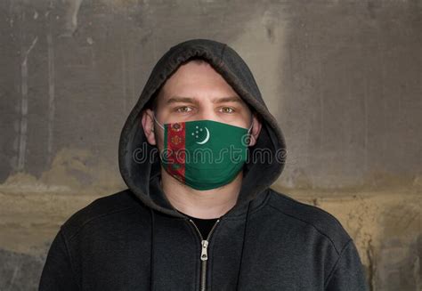 Man Wearing A Hood And A Turkmenistan Flag Mask To Protect Him Virus