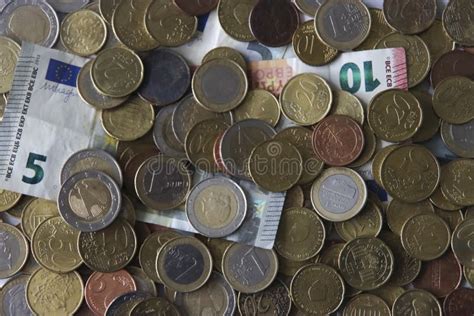 Euro Coins And Bank Notes From The Countries In The European Union