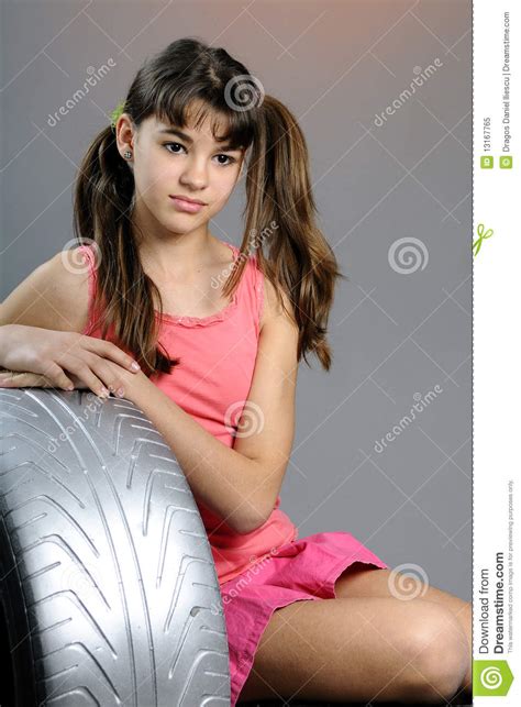 Teen Girl Posing With Silver Tires Stock Image Image Of Happy