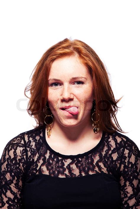Cute Redhead Girl Showing Her Tongue Stock Image Colourbox