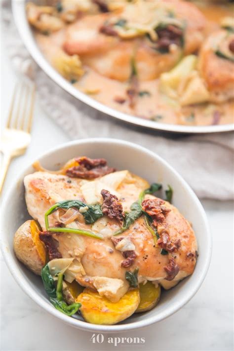 In a large nonstick skillet, brown chicken in oil. Healthy Creamy Tuscan Chicken with Artichokes (Whole30 ...