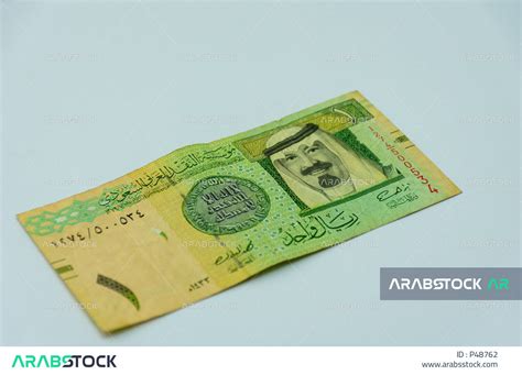 صورة لورقة نقدية من فئة 1 ريال سعودي من الإصدار الخامس، صورة الملك عبد الله بن عبد العزيز ال