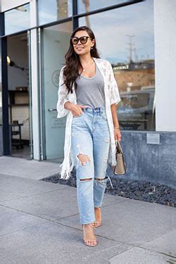 Cowgirl Biker Style Jeans Mom Jeans On Stylevore