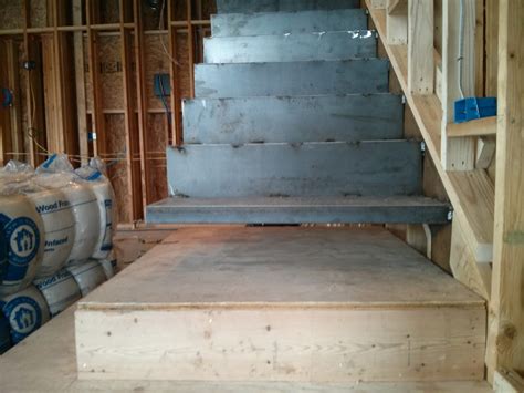 The design of this staircase has been carefully considered to ensure it snakes neatly up and behind the wall that forms part of this entrance hallway. Cantilevered Stair in Modern Home — EVstudio, Architect ...