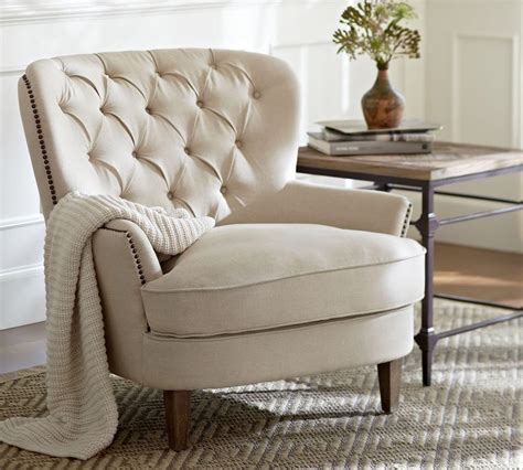 This charge is listed below the item price. Cardiff Tufted Upholstered Armchair - Ivory | Pottery Barn AU