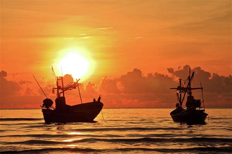 Two Fishing Boats At Sunrise Photograph By Monthon Wa Fine Art America