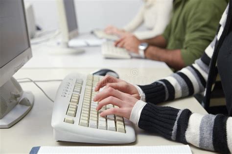Learn typing in virtual computer keyboard using our windows store app in a easy way. Students Typing On Keyboard In Computer Class Stock Photo ...