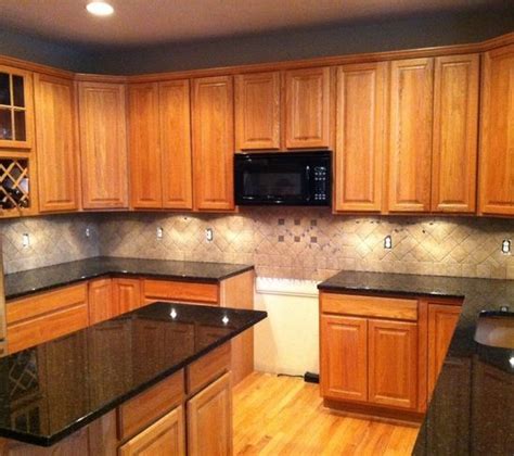 Most light colored granite countertops fall under the whites/beige family and are more common granite colors. light colored oak cabinets with granite countertop ...