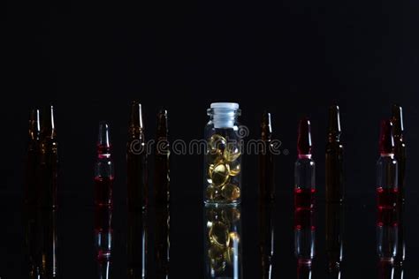 Pill Bottle And Pills In Isolated On Black Concept Pharmacy Stock Image