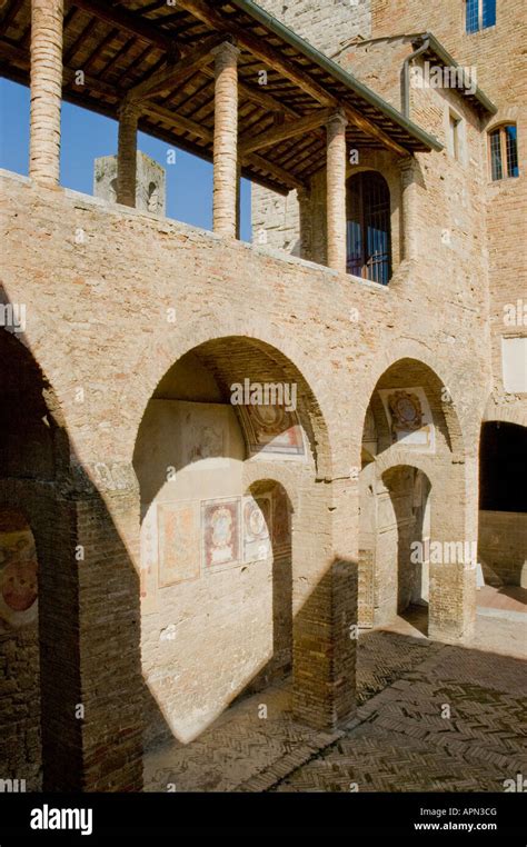 the courtyard of the palazzo del popolo near the piazza del duomo in san gimignano tuscany