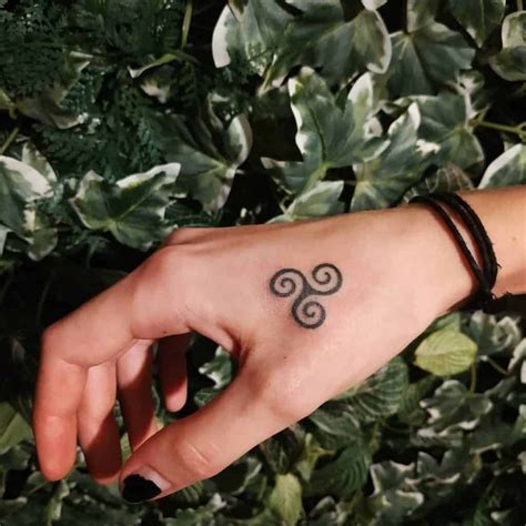 12 Triskelion Tattoo Designs With Meanings And Ideas Body Art Guru