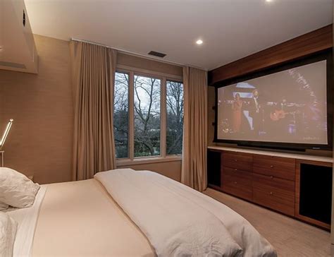 Having a small bedroom myself, i definitely didn't want to waste money by keeping my furnace on just to stay warm! Bedroom Projection Screen | Home, Tv decor, Small modern ...