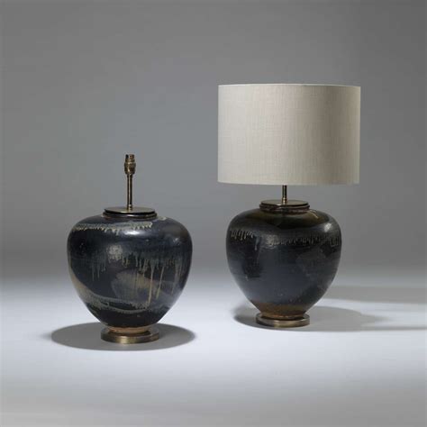 Pair Of Large Black Ceramic Urn Lamps With Dribble Glaze On Round