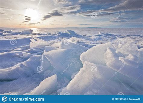 Sunset Landscape With Glowing Hummocky Ice On Baikal Blue And Pink Ice