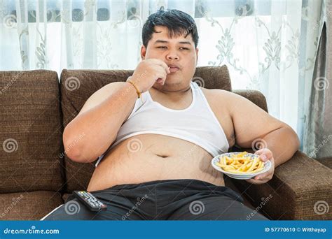 Lazy Overweight Man Eating Pizza While Laying On A Bed Stock Photography Cartoondealer Com