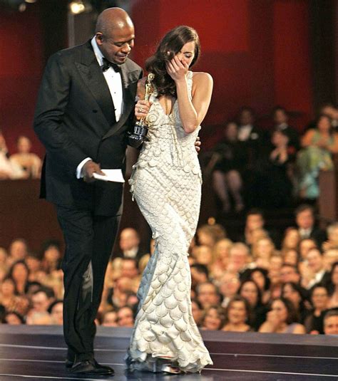 Forest Whitaker Escorts Marion Cotillard Off The Stage After Presenting Her With The Oscar For