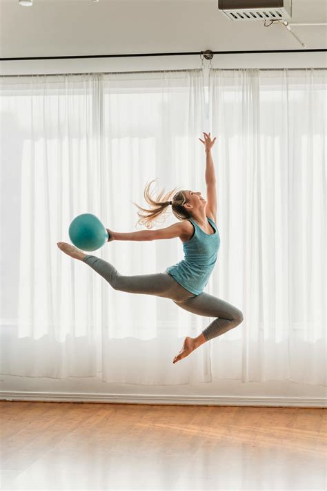 Fit Woman Doing Gymnastic Exercise With Fit Ball · Free Stock Photo